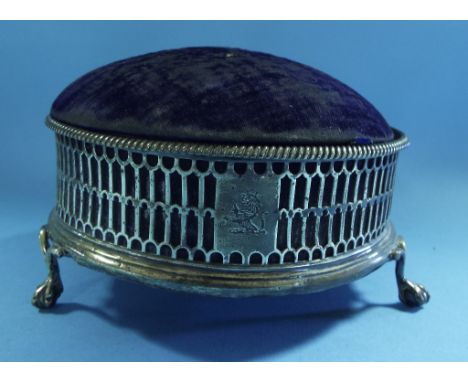 A George III silver wine coaster, crested, London 1774, later inset a pincushion Condition report Report by GH

The pin cushi