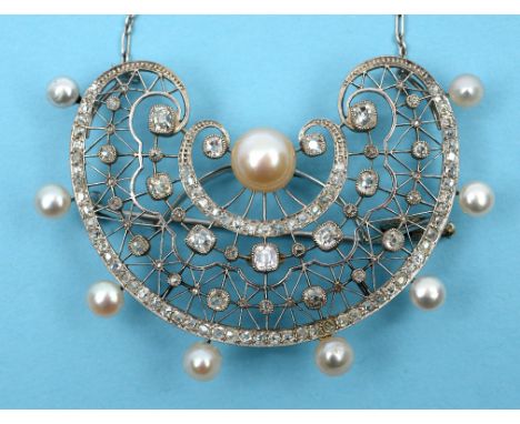 A white coloured metal, natural pearl and diamond fan brooch, with safety chain  See front cover colour illustration