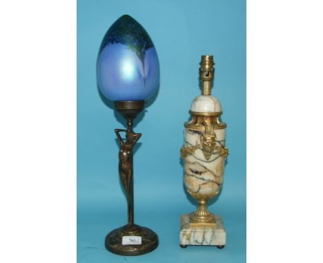 A marble table lamp, with gilt metal mounts, in the form of Bacchus, 39 cm high, an early 20th century work lamp, 45 cm high,