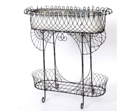 A wirework conservatory planter, with an undertier, 78 cm wide  See illustration