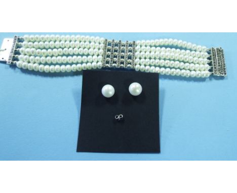 A silver, faux pearl and marcasite bracelet, and a pair of similar stud earrings (a.f.)