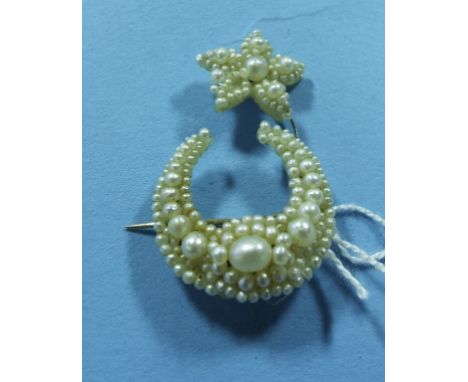 A pearl brooch, in the form of a crescent and star, boxed