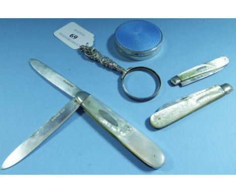 A silver and mother of pearl fruit knife, Sheffield 1897, two others, a silver and enamel compact, Birmingham 1932, and a mag