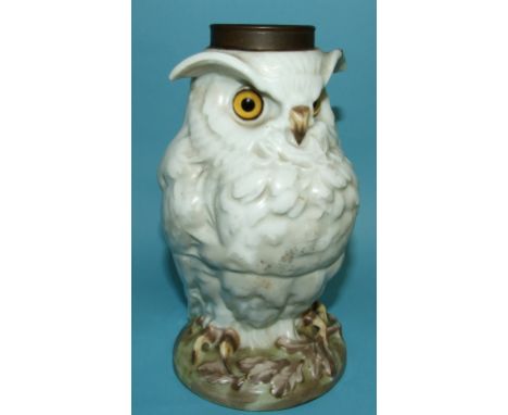A Continental lamp base, in the form of an owl (ear glued), 18 cm high