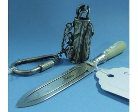 A Victorian silver and and mother of pearl bookmark, in the form of a trowel, Birmingham 1876, and a silver keyring, in the f