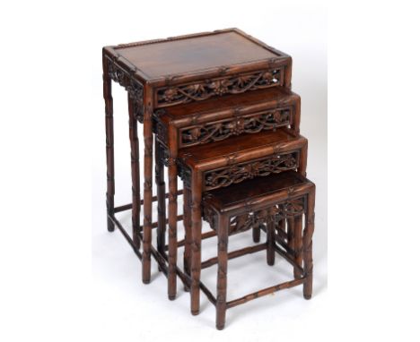 A nest of four Chinese occasional tables, carved bamboo, the largest 50 cm wide  See illustration Condition report Report by 