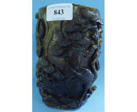 A Chinese jade brush pot, carved birds amongst foliage (a.f.), 14 cm high Condition report Report by RB

Probably 20th centur