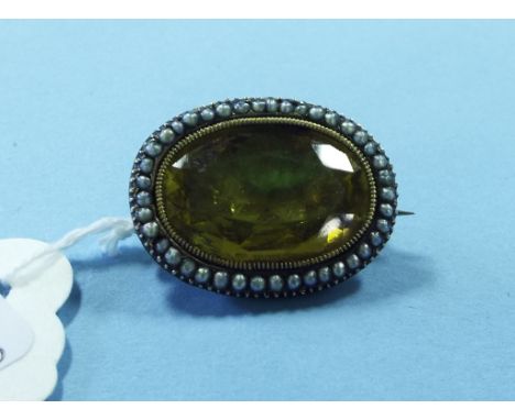 A Victorian oval citrine and seed pearl brooch