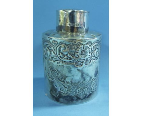 A silver tea caddy, with embossed decoration, Sheffield 1897, approx. 1.9 ozt, 7.5 cm high