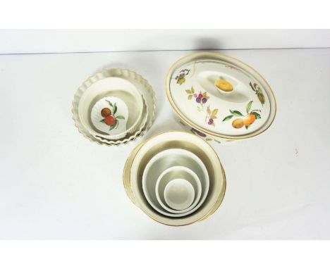 A large Royal Worcester covered vegetable tureen, decorated with harvested fruits and asparagus, together with assorted table