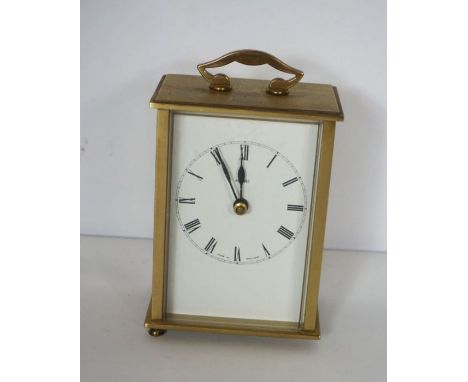 A quantity of assorted items including a copper jug, terrier shaped door stop, carriage clock and other ephemera (a lot)