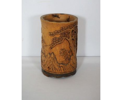 A 20th century Chinese carved bamboo brush pot, 18cm high; together with an assortment of objects including two ceramic quail