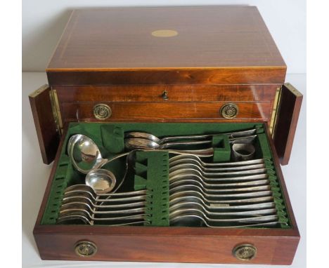 An Old English pattern canteen of silver plated flatware, for twelve place settings, in a fitted case, with hinged lid and tw