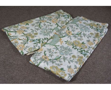 A pair of Chinoiserie decorated lined curtains, decorated with birds amongst foliage, on light cream ‘silk’ ground, each is 2