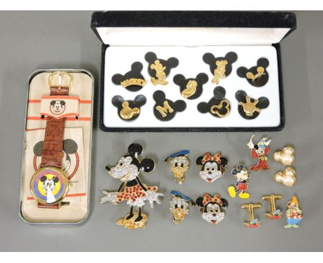 A collection of Walt Disney gold-plated enamel and paste set jewellery,to include a Limited Edition Mickey Mouse 1st Disneyan
