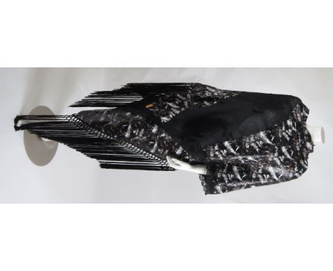A Jean-Pierre Saks pour Caron Paris black tulle evening wrap, edged in black lace with micro sequin panels in black, white an