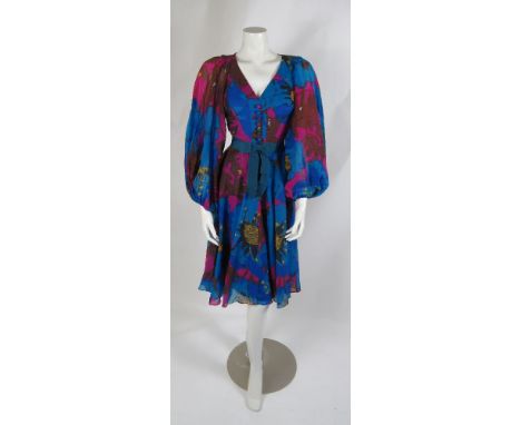 A Yves Saint Laurent 1970s silky chiffon dress,in multi-tonal floral print, andan Yves Saint Laurent silk floral top (2)