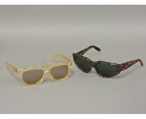 A pair of Ray-Ban onyx WO804 vintage sunglasses,with original case,together with a pair of Paloma Picasso Retrosun transparen