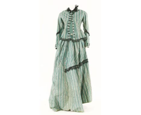 A late Victorian green silk two-piece day dress,forest green and pale green stripe woven with a black geometric design, black