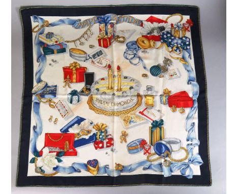 A Chopard silk 'Happy Diamonds' silk scarf,blue border with birthday cake motif to centre, surrounded by gift boxes reading '