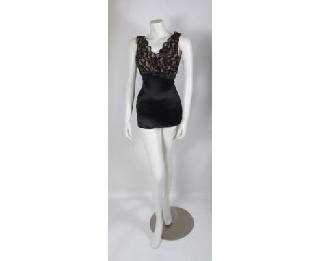 A 1950s Catalina swimsuit bodice,with black lace bodice and bow detail,approximate size 8-10