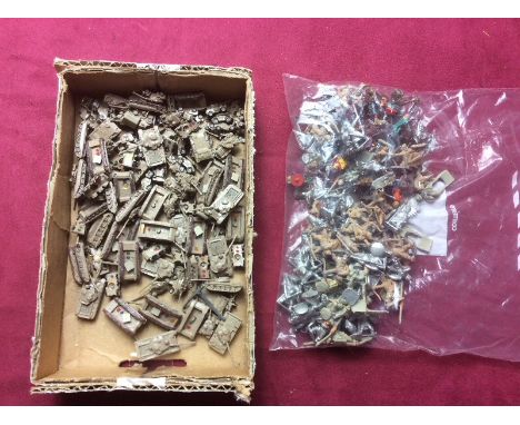 A collection of metal toy figures and tanks