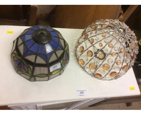 A Tiffany style light shade and one other light shade