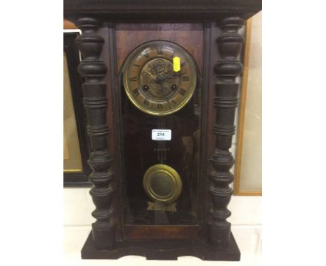 A late Victorian Vienna two hole wall clock 