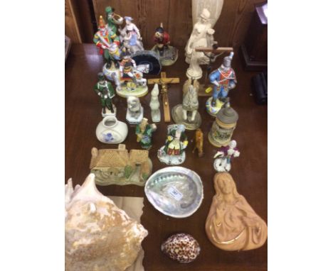 A quantity of various figures; a model house; a large shell etc.