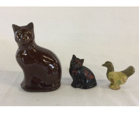 2 19th century ceramic cats & a miniature bird whistle