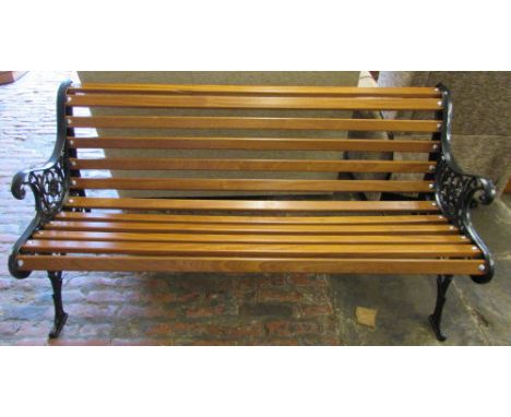 Cast iron and wooden garden bench