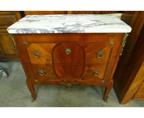 A French Louis XV style mahogany, marquetry inlaid and ormolu mounted commode, with white marble top