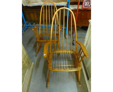 A pair of Ercol style rocking chairs