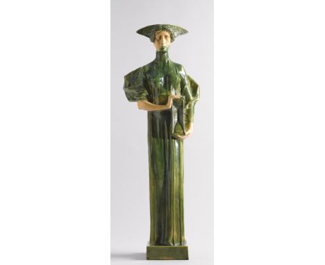 Michael Powolny (Austrian, 1871-1954) FEMALE FIGURE HOLDING AN HOURGLASS glazed ceramic signed on base Michael Powolny was a 