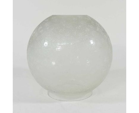 An etched clear glass oil lamp shade, decorated with flowers, four inch aperture, 18cm diameter