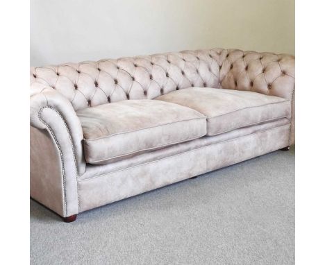 A modern hide upholstered chesterfield sofa, with a button back, by Chesterfield Couture248w x 96d x 75h cm