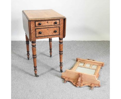 A Victorian maple ladies work table, on ring turned legs, together with an Edwardian walnut wall shelf, with a mirrored back 