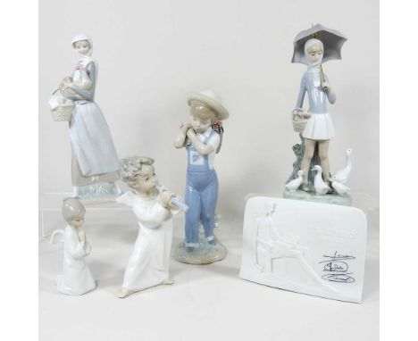 A collection of five Lladro figures, unboxed, highest 27cm, together with a small Nao angel (6)