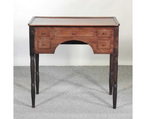 A Regency rosewood lowboy, on ring turned legs80w x 46d x 78h cm