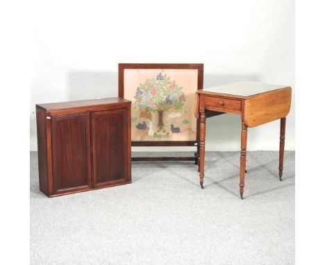 A 19th century pembroke table, together with an early 20th century hanging wall cabinet and a fire screen (3)66w x 66d x 53h 