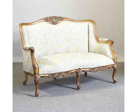 A modern gilt framed and floral upholstered sofa, on cabriole legs133w x 63d x 93h cm