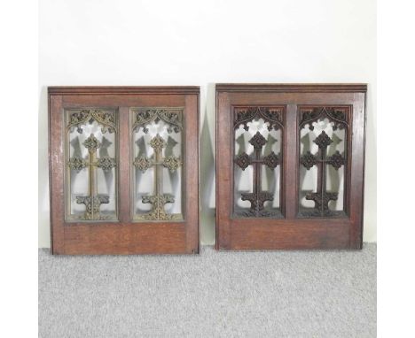 A pair of 19th century ecclesiastical carved oak panels, each inset with a pointed arch, 61 x 68cm