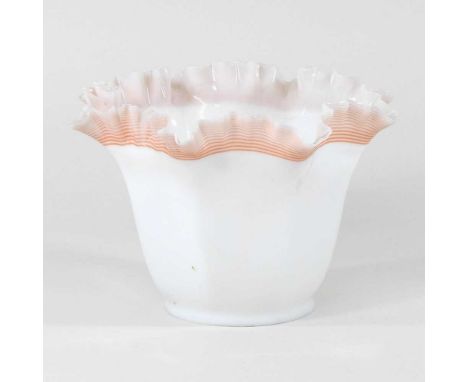 A white glass oil lamp shade, with a frilled edge, 15cm high
