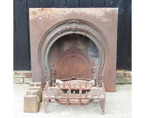 A Victorian cast iron fire insert, 96w x 95h cm, together with two weights and a cast iron fire grate (4)