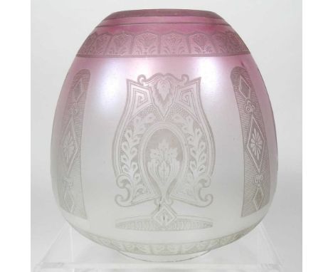 A clear and red glass oil lamp shade, with etched decoration