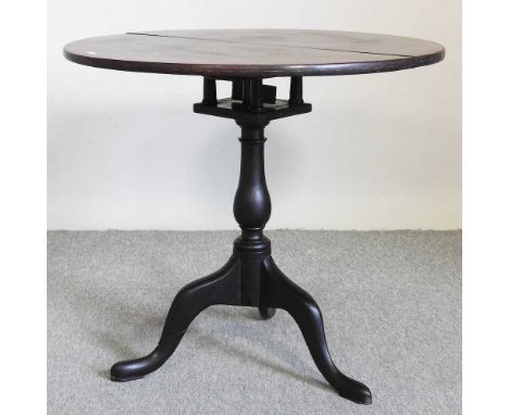 A 19th century mahogany occasional table, the hinged top with a birdcage action, on a tripod base, 75cm