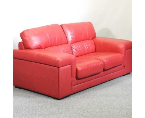 A modern red leather upholstered two seater sofa197w x 95d x 88h cm