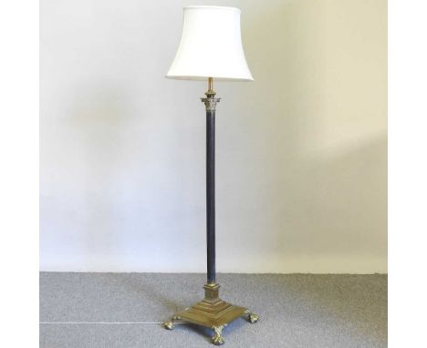 A 19th century brass telescopic standard lamp, in the form of a corinthian column, with shade, 163cm high overall