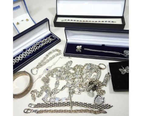 A collection of silver jewellery, to include necklaces and a bangle, together with a 1918 Ironmonger's year book