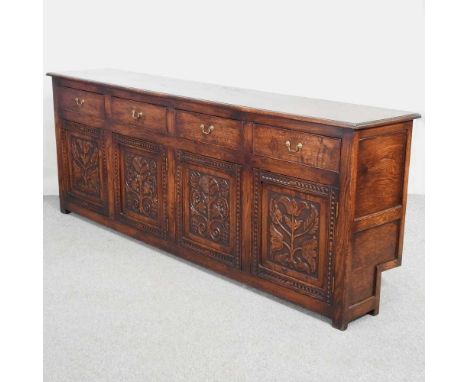 A bespoke made 18th century style oak sideboard, modern, containing four drawers and cupboards, cut out approximately 16d x 2